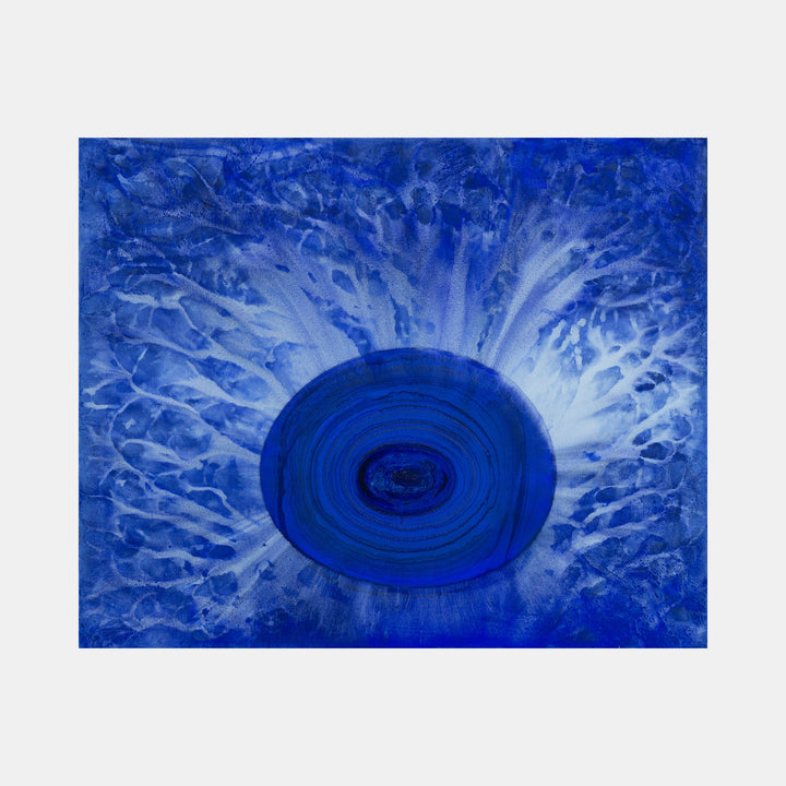 The artwork 'Biophilia 21' by George Stanojevic features a striking deep blue circular vortex centered on canvas, radiating outward with dynamic splashes and organic patterns resembling water ripples or cosmic energy. The natural pigments and medium create an ethereal effect with lighter blue streaks emerging from a dark spiral core, showcasing the influence of natural elements.