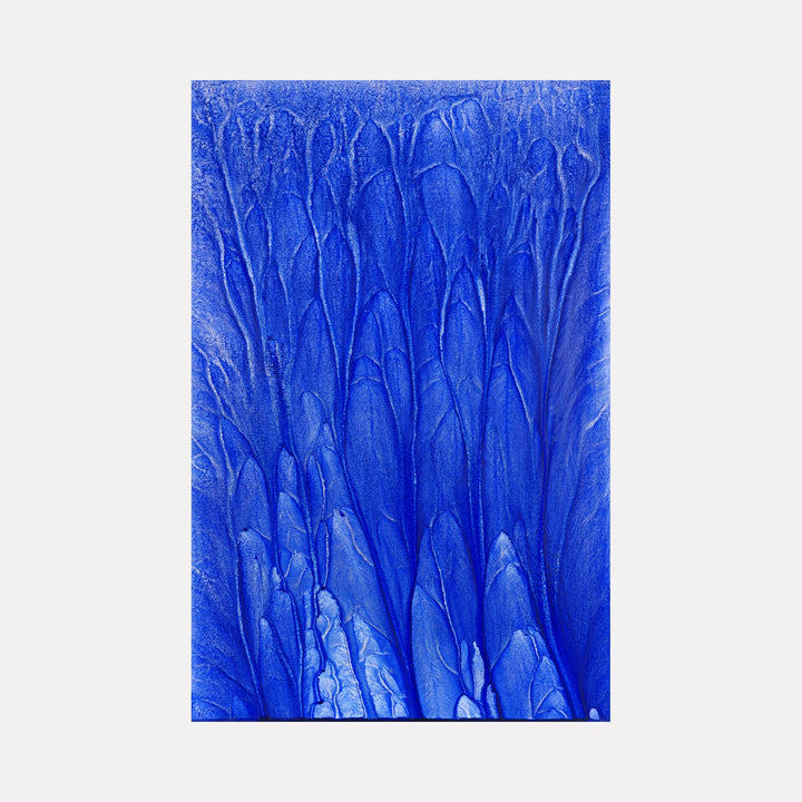 The artwork 'Biophilia 25' by George Stanojevic features vibrant cobalt blue textures resembling organic flowing patterns. Abstract vertical streaks create a nature-inspired movement, with varying shades of blue creating depth and dimension. The textured surface shows the interplay of pigments and natural elements on canvas.