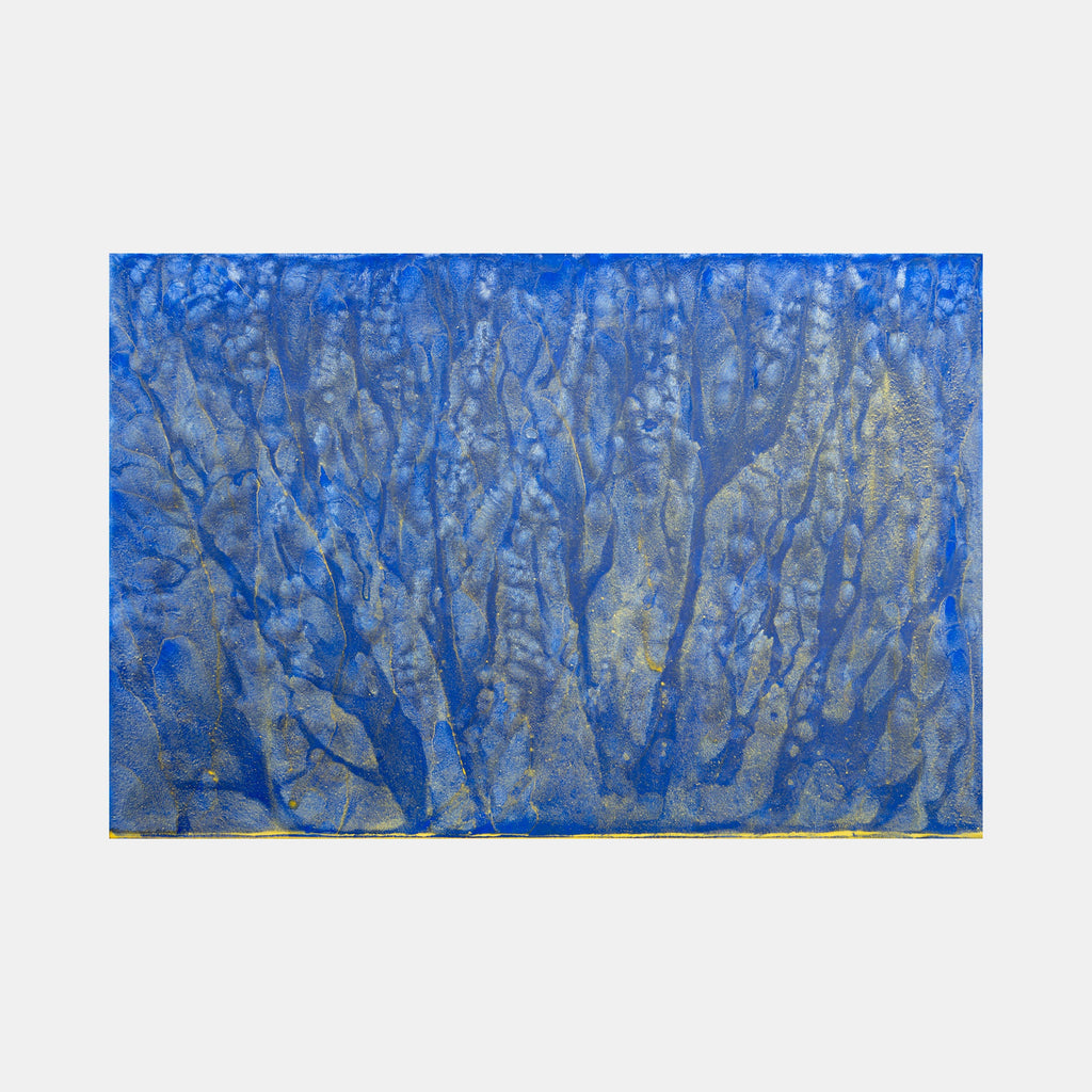 The artwork 'Biophilia 31' by George Stanojevic features organic branching patterns resembling river deltas or tree branches in vibrant cobalt blue and silver. The abstract composition shows textural elements created by natural elements, with flowing watercolor-like effects and metallic accents across the canvas surface, embodying a harmonious blend of controlled artistry and natural processes.