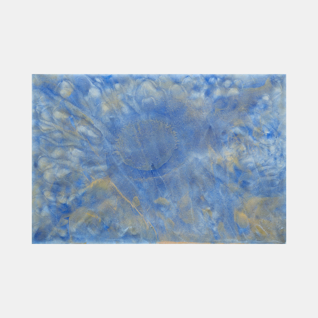 The artwork 'Biophilia 47' by George Stanojevic features ethereal blue and silver tones swirling across canvas, creating an atmospheric abstract composition. Natural elements blend to form cloudy textures and organic patterns, with golden undertones emerging through layers of azure pigment, showcasing the influence of sunlight and water on the medium.