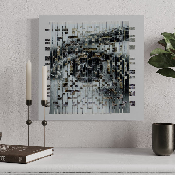 The artwork 'Ancient' by Kiana Honarmand features an intricately woven geometric pattern created from hand-cut giclee prints. The composition displays a mesmerizing mosaic of vertical and horizontal strips in monochromatic tones of black, white, and gray, creating a fragmented, abstract visual effect. The 16x16 inch piece demonstrates a contemporary interpretation of traditional weaving techniques.