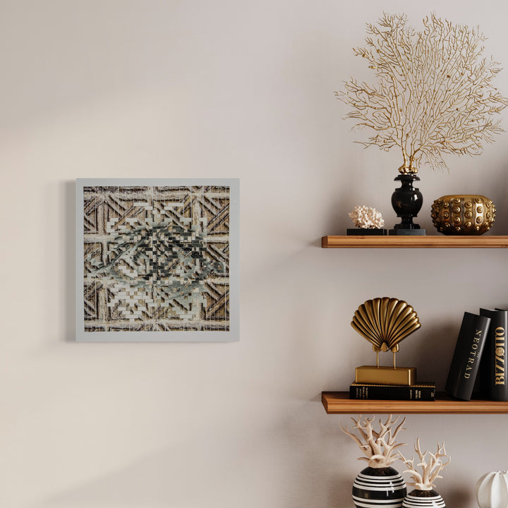 The artwork 'Geometric Clash' by Kiana Honarmand features intricate hand-cut and woven patterns creating a striking monochromatic composition. Bold geometric shapes and angular lines intersect in a mesmerizing mosaic-like design, framed in white. The 18x18 inch giclee print artwork combines modern precision with traditional Middle Eastern motifs.