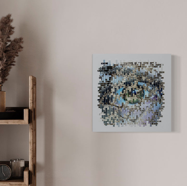 The artwork 'Heather' by Kiana Honarmand features an intricately woven composition of hand-cut giclee prints, creating a mosaic-like pattern in shades of blue, gray, and white. The 16x16 inch piece displays a fragmented, pixelated effect with geometric squares arranged in a circular formation, suggesting depth and movement through layered elements and tonal variations.