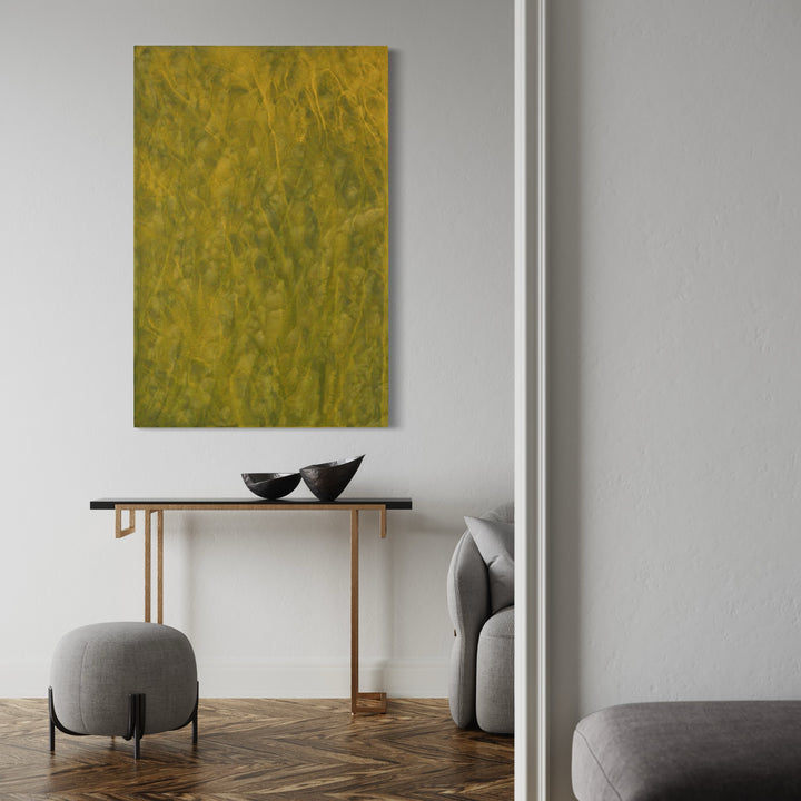 The artwork 'Biophilia 33' by George Stanojevic features a richly textured abstract canvas in vibrant chartreuse and olive tones. Natural elements have influenced the organic, flowing patterns across the surface, creating a dynamic interplay of light and shadow. The piece showcases a unique technique combining pigments with environmental elements for a natural, biomorphic effect.