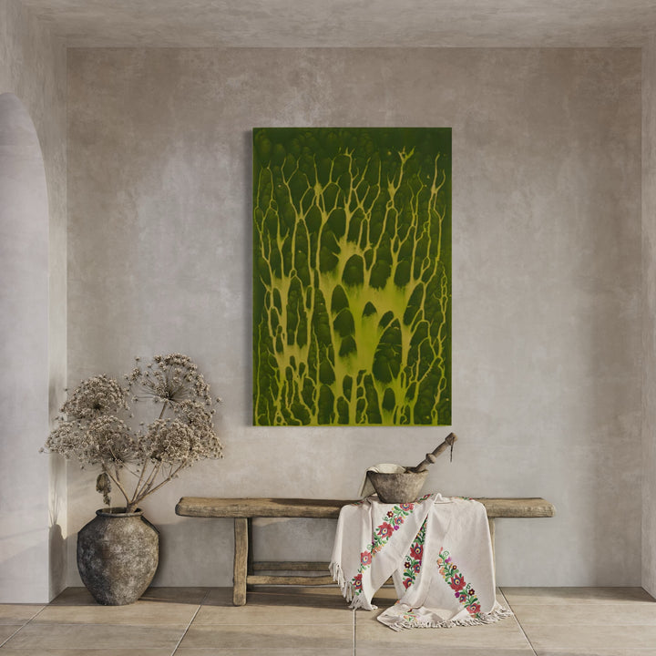 The artwork 'Biophilia 38' by George Stanojevic features organic, branching patterns in luminous yellow against a deep forest green background, creating a mesmerizing dendritic effect reminiscent of neural networks or growing tree branches. The abstract composition displays nature-inspired textures achieved through the unique interaction of pigments, sunlight, water, and earth on canvas.