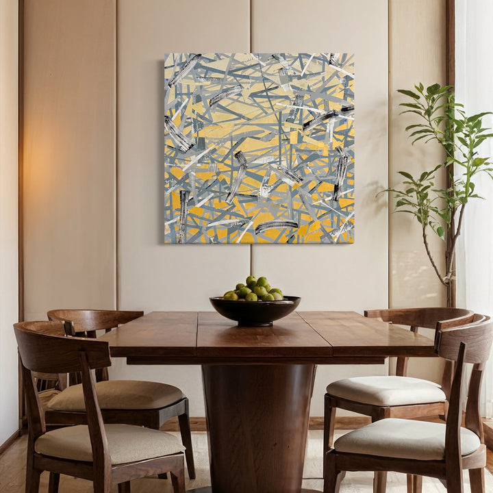 A photo of the artwork Blaze of Yellow, by Shira Toren, hanging on a wall.