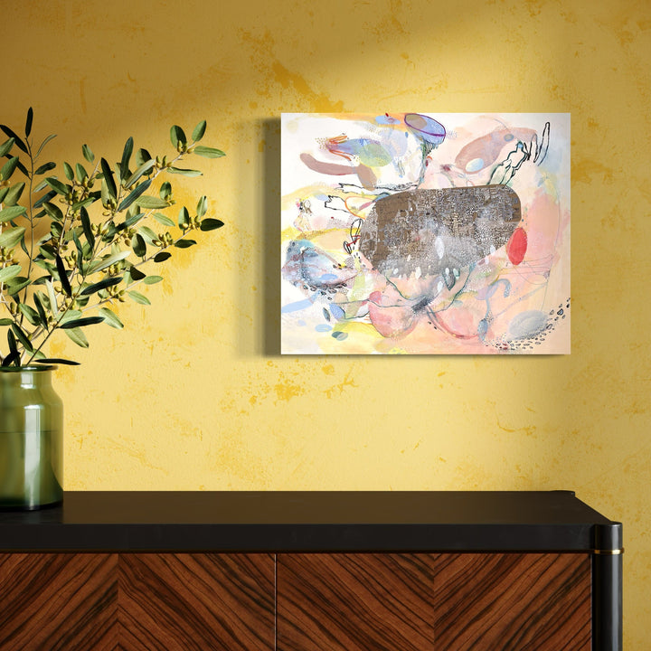 A photo of the artwork Blimp, by Amy Decker, hanging on a wall.