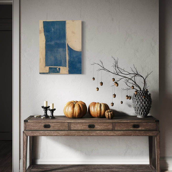 A photo of the artwork Blue on Buff , by Diane Englander, hanging on a wall.