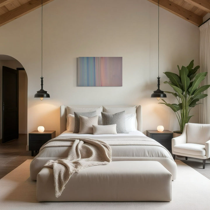 The artwork 'Carrying and Soaring 5' by Willy Bo Richardson features soft vertical bands of pastel colors transitioning from cool blues to gentle pinks, displayed above a modern bedroom setting. The abstract painting on wood panel showcases a minimalist gradient style with acrylic and oil mediums creating a serene, atmospheric effect. By Willy Bo Richardson.