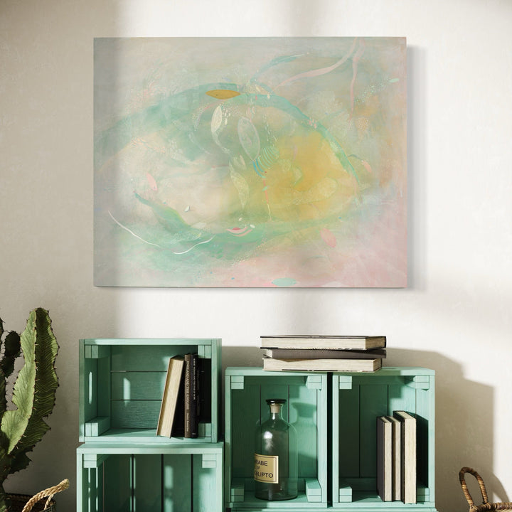 The artwork 'Dream 01' by Amy Decker features ethereal swirls of mint green and soft yellow hues blending seamlessly on mulberry paper. Abstract brushstrokes create a dreamy, atmospheric composition with delicate layers of mixed media, suggesting movement and light. The gentle color palette evokes a sense of tranquility and floating elements against a pale background.