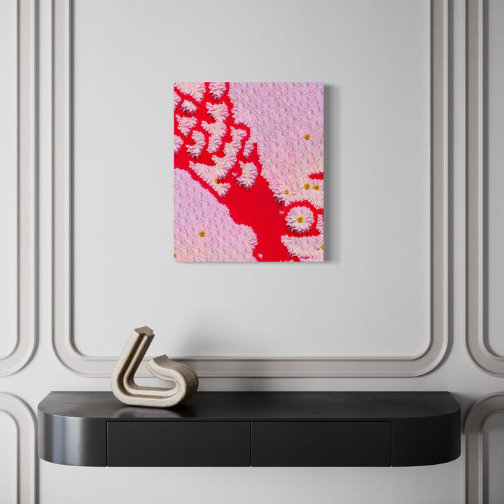 The artwork 'GRAS (generally regarded as safe)' by Dirk Westphal features a striking abstract composition with vibrant red splatter patterns against a soft pink textured background. The contrast creates a dynamic, organic form resembling fluid movement or cellular structures. The editioned signed photo displays a contemporary experimental aesthetic, mounted on a stark white wall.