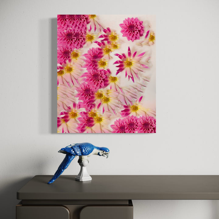 The artwork 'GRNAS' by Dirk Westphal features vibrant pink dahlias and daisies arranged in a dynamic pattern against a soft pink background. The flowers create a mesmerizing floral composition with bright yellow centers, captured in a high-quality photographic print that combines artistic arrangement with botanical detail. - Dirk Westphal