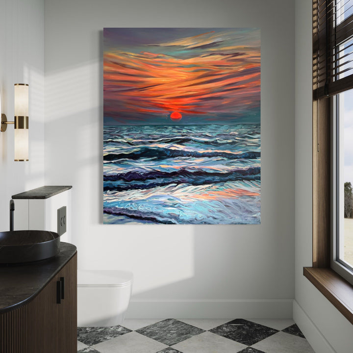 The artwork 'Goan Sunset' by Claudia Robles-Gil captures a dramatic seascape with turbulent waves in deep turquoise and cobalt blue, beneath a vibrant orange and red sky. Wispy clouds streak across the horizon while a bold crimson sun descends into the ocean. The oil and acrylic painting showcases dynamic brushstrokes creating movement in both water and sky, measuring 60x48 inches.