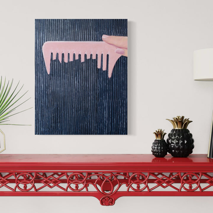 The artwork 'Hair' by Anastasia Korsakova features a minimalist composition of a large pink comb against a textured navy blue background with vertical striations. The oil painting depicts the comb in a melting, dripping style, creating a surreal effect against the rhythmic lined pattern. The 24x30 inch canvas showcases contemporary pop art aesthetics with bold color contrast. By Anastasia Korsakova.