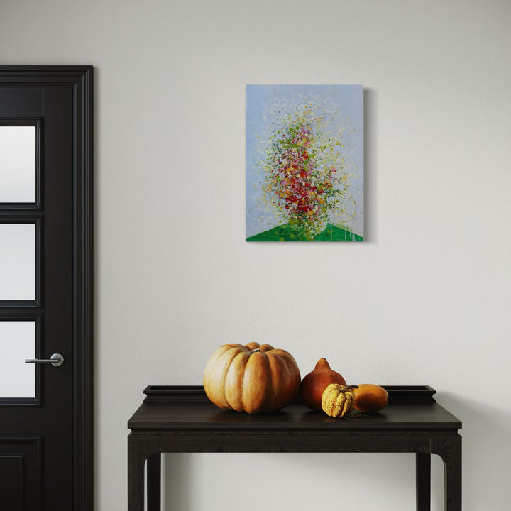 A photo of the artwork In Bloom, by Matthew Cramer, hanging on a wall.