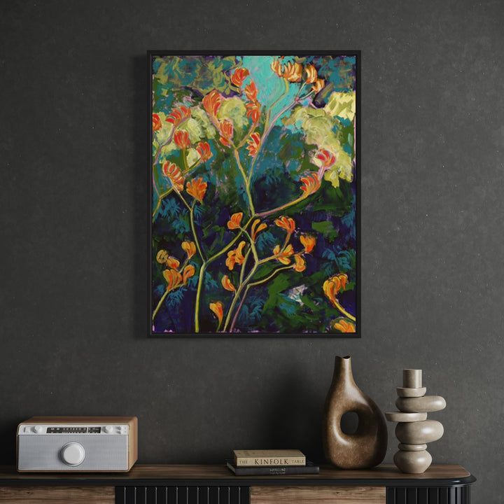 The artwork 'Kangaroo Paw' by Cristi Lyon features vibrant orange-red flower stems against a rich backdrop of deep turquoise and emerald greens. Oil on paper painting captures the distinctive curved blooms of the kangaroo paw plant, with gestural brushstrokes creating dynamic movement throughout the 30x22 inch composition.