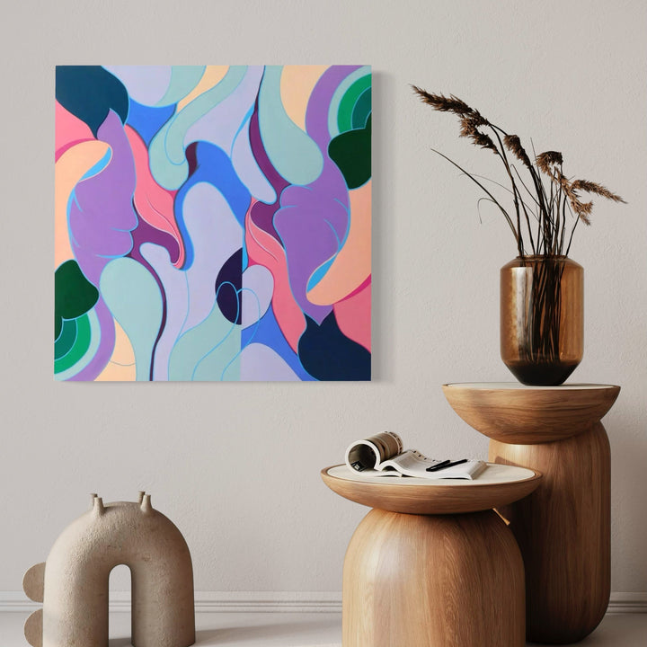 The artwork 'Les Fleurs Animees' by Ellannah Sadkin features flowing, abstract organic shapes in a vibrant palette of pastel blues, purples, pinks, and mint greens. The 30x30 inch acrylic painting showcases smooth, curving forms that interweave across the canvas, creating a dynamic composition reminiscent of blooming flowers in motion. The modern artwork demonstrates a harmonious balance of soft and bold color transitions.