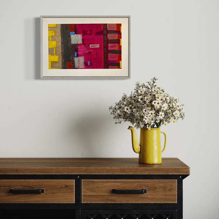 A photo of the artwork Light A Candle-1, by Cora Jane Glasser, hanging on a wall.