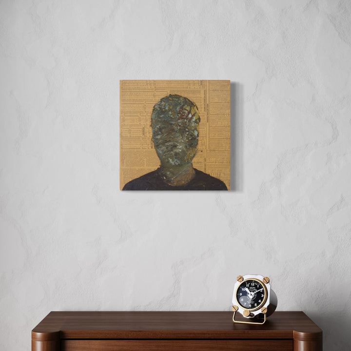 A photo of the artwork Marketed, by Matthew Cramer, hanging on a wall.