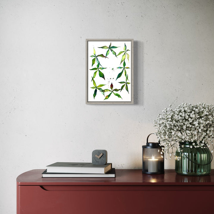 The artwork 'Money Tree Shot' by Monica Carrier features vibrant green bamboo-like leaves arranged in an organic pattern against a white background. The watercolor-style illustration shows delicate stems and foliage in fresh emerald tones, rendered in archival ink on paper, creating a minimalist botanical wall art piece that measures 14 by 10 inches.