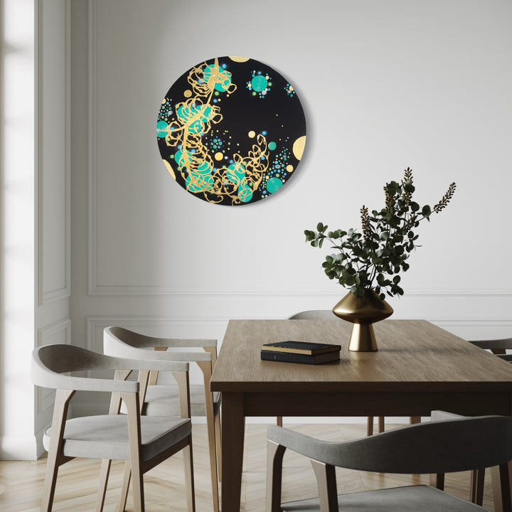 The artwork 'Mystic Meanderer' by Eric Jiaju Lee features a circular composition with swirling turquoise and golden patterns against a deep black background. Fluid, organic forms reminiscent of celestial bodies and underwater currents dance across the silk canvas. The 36-inch round acrylic painting creates a cosmic effect with splattered details and ethereal color transitions.