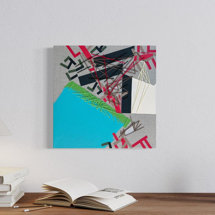 The artwork 'Nakkar Menndriis' by Philippe Halaburda features abstract geometric patterns with bold pink and black angular shapes against a striking turquoise background. Mixed media composition combines precise tape lines, textured yarn elements, and acrylic paint, creating dynamic intersections and spatial depth on a 20x20 inch canvas. By Philippe Halaburda