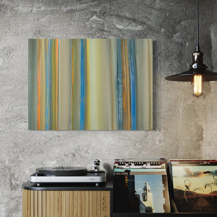 The artwork 'Navigation 8' by Willy Bo Richardson features vertical stripes in a harmonious blend of earthy yellows, vibrant blues, and soft orange hues. The oil on paper piece showcases fluid brushstrokes creating a dynamic sense of movement, with translucent layers merging to form a serene, contemporary abstract composition measuring 22 by 30 inches.