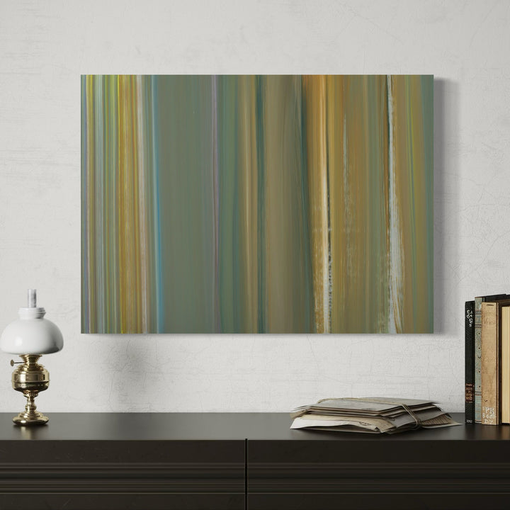 The artwork 'Navigation 9' by Willy Bo Richardson features vertical stripes in muted sage green, golden yellow, and soft blue tones, creating a serene abstract composition. Oil on paper technique produces subtle texture variations and translucent layers, with graceful brushstrokes flowing from top to bottom.