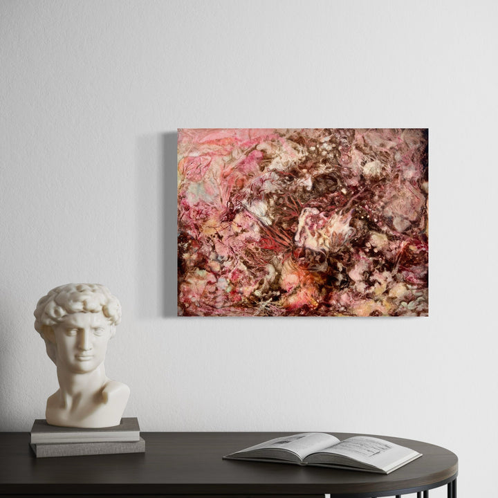 A photo of the artwork Pink Nebulae, by Cynthia Sumner, hanging on a wall.