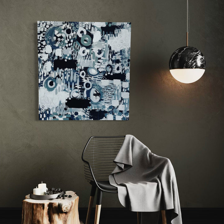 The artwork 'Pixelated Rainy Rooftop' by Alexandra Jamieson features an abstract composition in moody blue and white tones, creating a digital rain-like pattern. The painting combines geometric shapes, circular elements, and pixelated textures using acrylic paint and ink on canvas, expressing a modern interpretation of rainfall on an urban landscape.