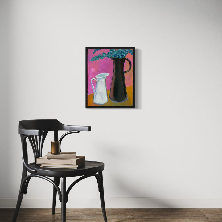 The artwork 'Rapunzel' by Cristi Lyon features a vibrant still life composition with two contrasting vessels - a white porcelain pitcher and a tall black vase set against a pink and orange gradient background. Blue-green foliage sprouts from the black vase, creating dynamic visual interest. Oil on paper, the piece showcases bold color blocking and modern interpretive style. By Cristi Lyon.