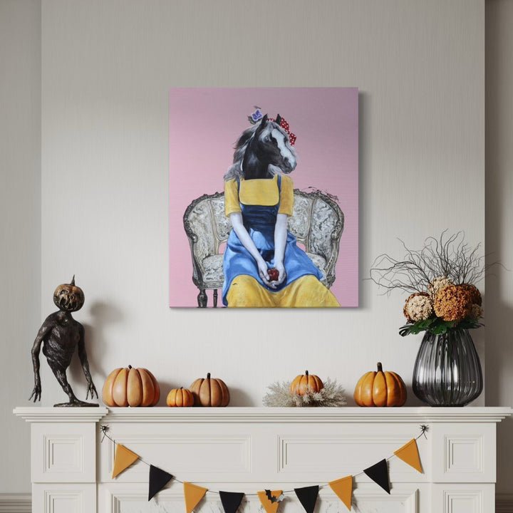 The artwork 'Red Apple in the Summer' by Carlos Gamez de Francisco features a surreal composition depicting a horse head figure seated in an ornate baroque-style gray armchair against a soft pink background. The figure wears a vibrant yellow dress with blue accents, creating a striking contemporary contrast with the classical furniture elements. Acrylic on canvas, 31x36 inches.