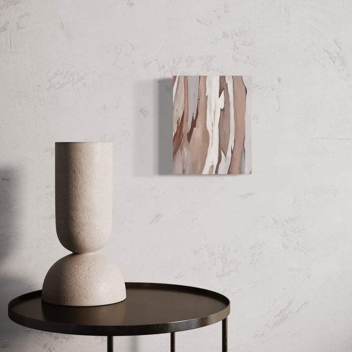 A photo of the artwork Stripped Eucalyptus, by Taylor Stoneman, hanging on a wall.