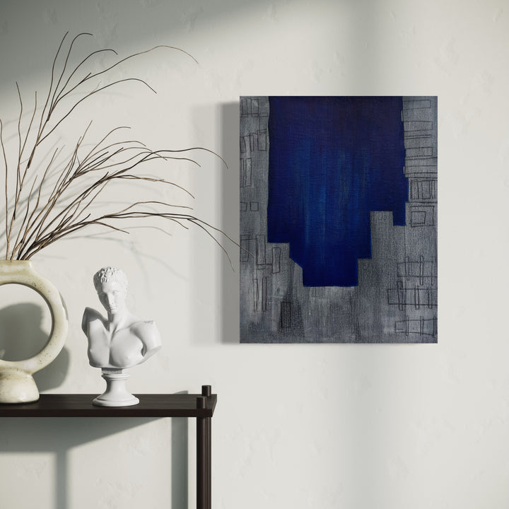 A photo of the artwork The Blue Hour (encroaching), by Cora Jane Glasser, hanging on a wall.