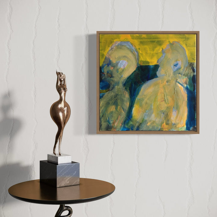 The artwork 'Two Gentlemen 1920' features two abstract figures rendered in ethereal blues and yellows against a vibrant golden background. The expressionist painting showcases fluid brushstrokes and translucent layers of acrylic paint, creating a dreamlike atmospheric quality within the 18x18 inch canvas. Art by Owen Brown.