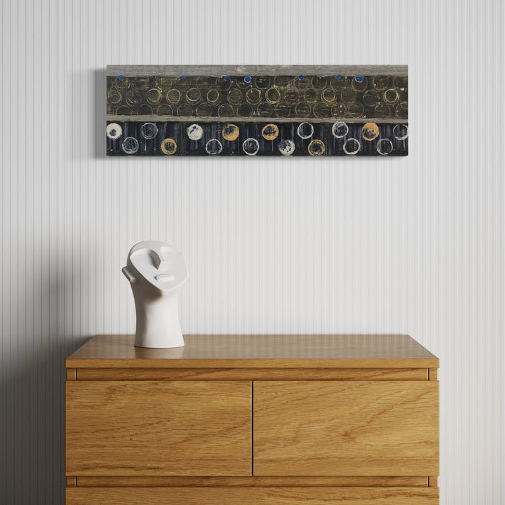 A photo of the artwork Vault Lights(Treads&Risers-6), by Cora Jane Glasser, hanging on a wall.