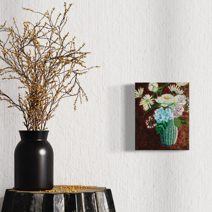 A photo of the artwork White Flower Bouquet, by Natasha Papousek, hanging on a wall.