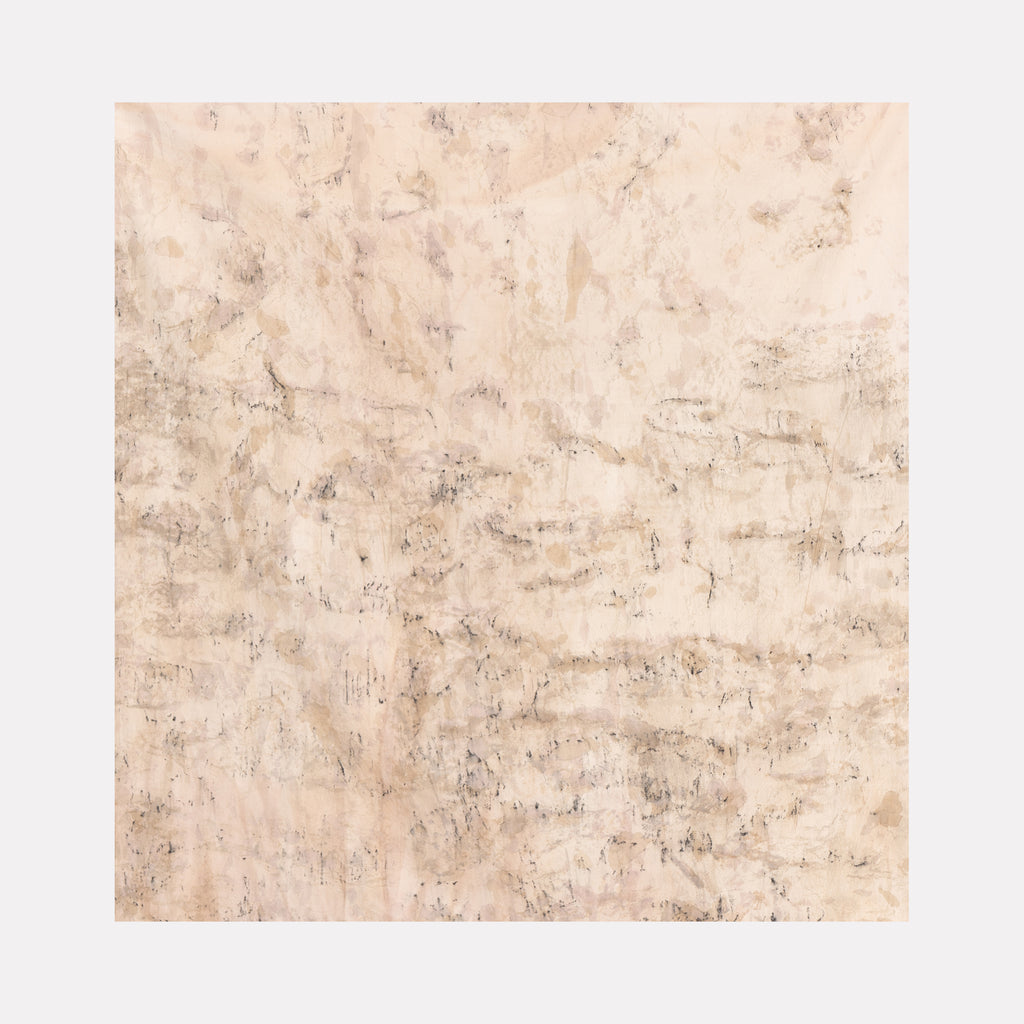 The artwork 'Distorsione di muro X' by Jacqueline Ferrante features a textural abstract composition in muted beige and cream tones. Natural stains from wine, coffee, and ash create a weathered, distressed surface resembling aged plaster or stone, with subtle charcoal markings creating depth and organic patterns across the linen canvas by Jacqueline Ferrante.