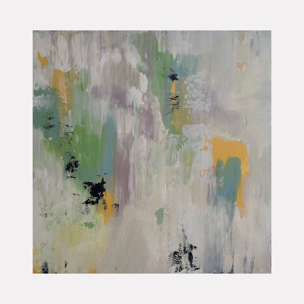 The artwork 'A Touch of Honey' features ethereal abstract brushstrokes blending soft sage green, golden honey, and misty gray tones. Textured mixed media elements create a dynamic vertical flow, with delicate splashes of turquoise and black accents scattered throughout the 36x36 composition. By Tammy Kushnir.