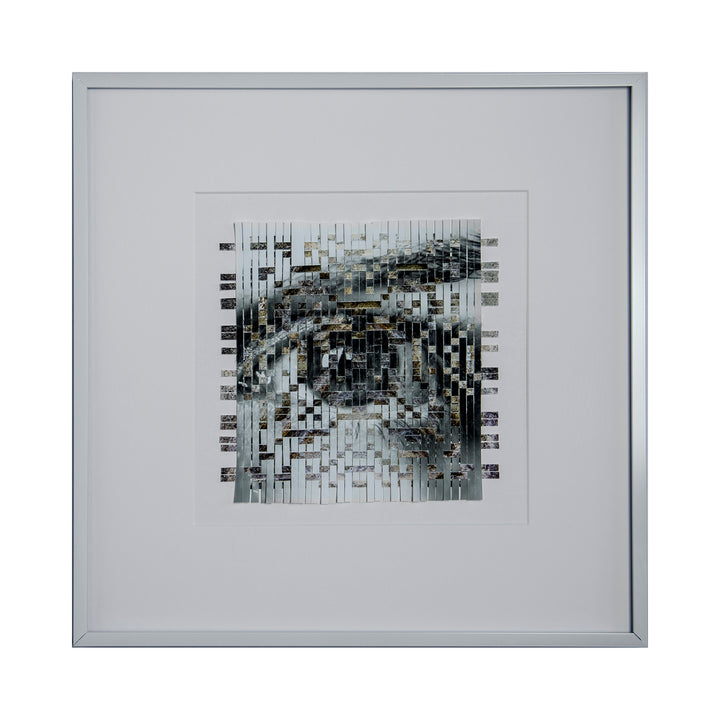 The artwork 'Ancient' by Kiana Honarmand features an intricate woven composition of hand-cut giclee prints in monochromatic tones. The abstract pattern creates a fragmented, pixelated effect using strips of black, white, and gray, arranged in a geometric grid formation. Framed in white, this 16x16 inch piece displays a modernist interpretation of texture and depth.