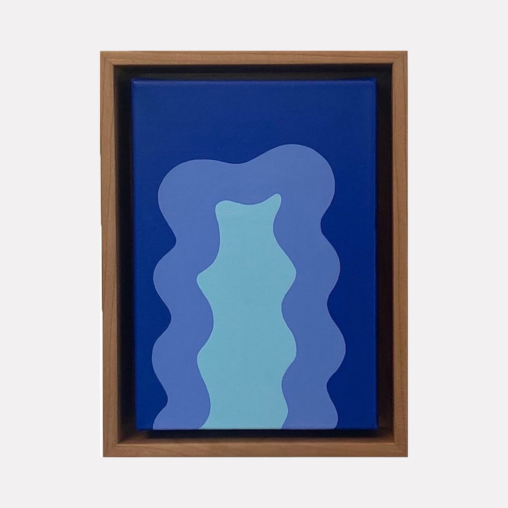 The artwork 'Blue Mini' by Shadia Sabagh features organic wavy shapes in varying shades of blue, from deep navy to soft turquoise, painted in acrylic on canvas. The composition shows layered fluid forms creating a harmonious abstract design within a wooden frame. 8x6 inches contemporary minimalist artwork.