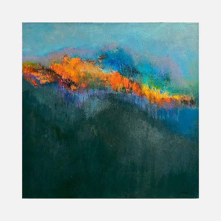 The artwork 'Chromatic Horizons' by Janyce Erlich-Moss features a vibrant abstract landscape with a dynamic band of fiery orange and golden hues breaking through deep teal and azure blues. The textured acrylic brushstrokes create a misty, atmospheric effect where vivid colors blend seamlessly across the horizon line, contrasting against a dark emerald base.