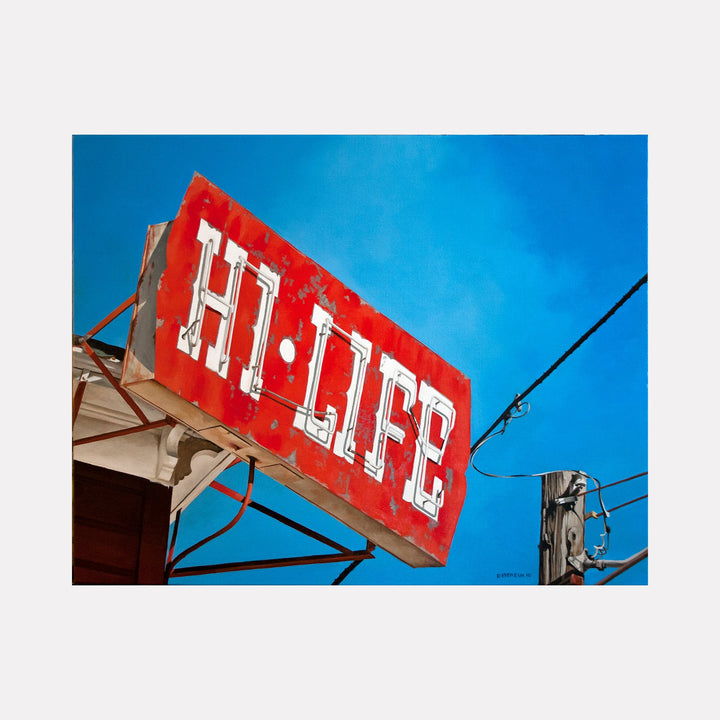 The artwork 'HI LIFE' by Alex Devereux captures a vintage red sign against a vibrant blue sky. The weathered metal sign features bold white lettering with a distressed, rustic texture. Power lines and utility poles frame the composition, creating an urban americana aesthetic. Acrylic on canvas, 22x28 inches.