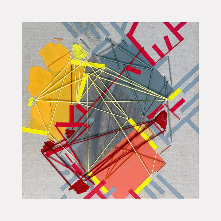 The artwork 'Kaamuura Av.' by Philippe Halaburda features vibrant geometric abstraction with intersecting yellow yarn lines creating a dynamic web pattern over angular shapes in orange, coral, and grey. Red angular elements and blue-grey stripes add depth, while tape and acrylic create distinct textural layers on canvas.