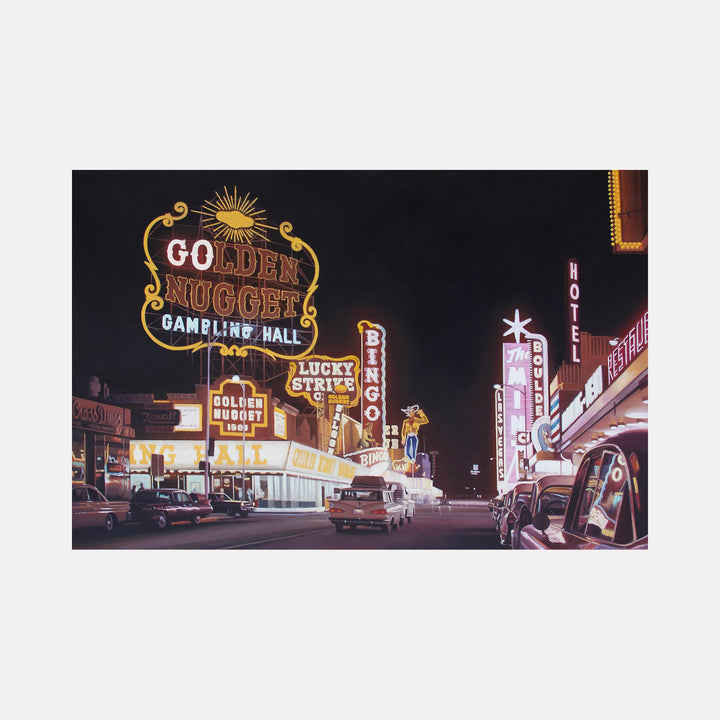 The artwork 'Las Vegas 1960' by Alex Devereux captures a vibrant nighttime scene of vintage Las Vegas, featuring the iconic Golden Nugget gambling hall's neon sign illuminating the strip. Classic cars line the street beneath glowing casino marquees and neon signs, creating a nostalgic atmosphere with rich amber and pink hues against a dark sky. Acrylic on canvas, 20x30 inches.