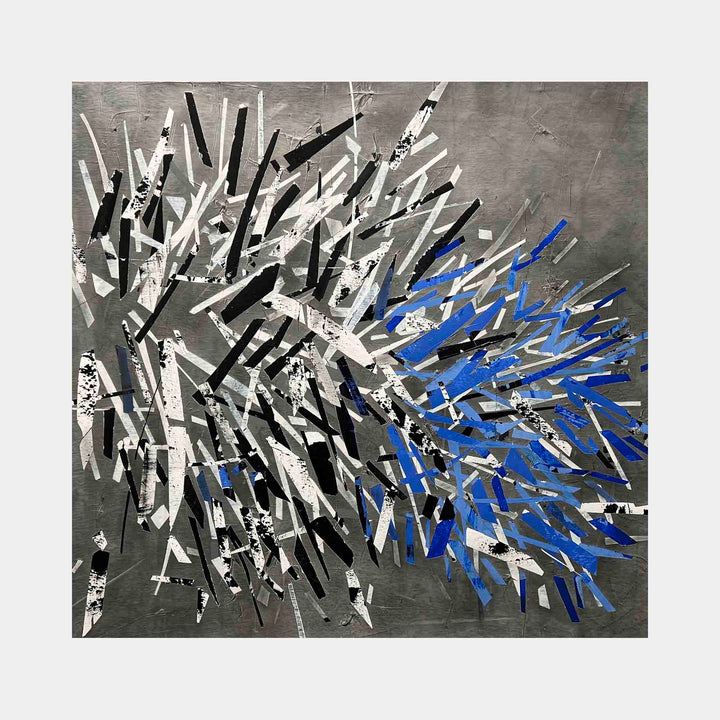 The artwork 'Under a Pine' features dynamic abstract brushstrokes exploding outward in a burst pattern, transitioning from stark black and white to vibrant electric blue. The composition combines sharp, angular marks with textural Venetian plaster and graphite on canvas, creating a dramatic sense of movement and energy. By Shira Toren.