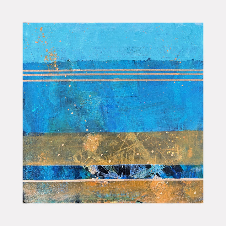 The artwork 'Under the Sea' by Karen L. Burns features horizontal layers of vibrant ocean blues and sandy golds, with textured acrylic creating a maritime abstract landscape. Splattered paint effects and metallic accents suggest underwater movement, while clean stripes divide the composition into distinct oceanic zones. Mixed media technique creates depth and dimension in this 12x12 inch contemporary seascape.