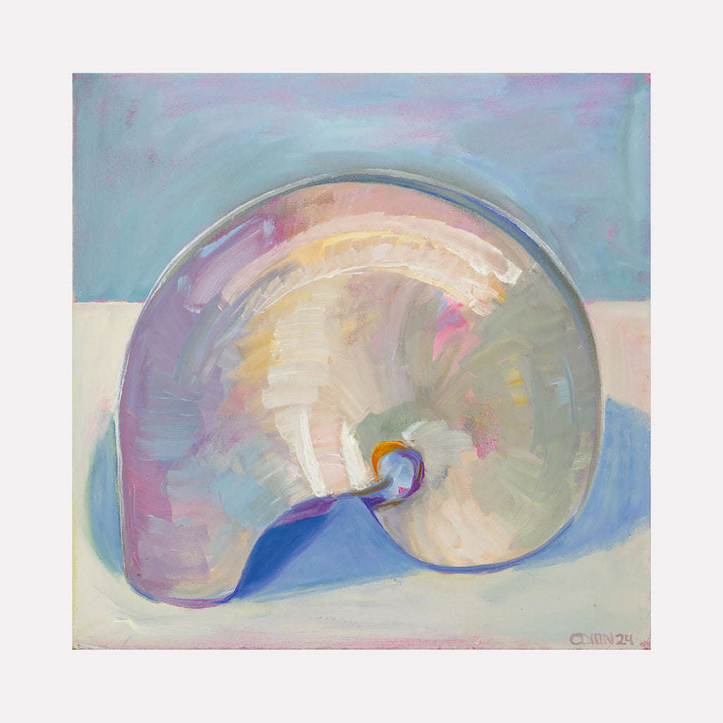 The artwork 'Nautilus' by Cristi Lyon features a luminescent seashell rendered in oil on canvas, displaying soft pastel hues of lavender, blue, and cream. The spiral shell form is painted with delicate brushstrokes, creating an iridescent effect against a serene blue-tinted background, capturing the natural beauty and mathematical perfection of nautilus geometry.