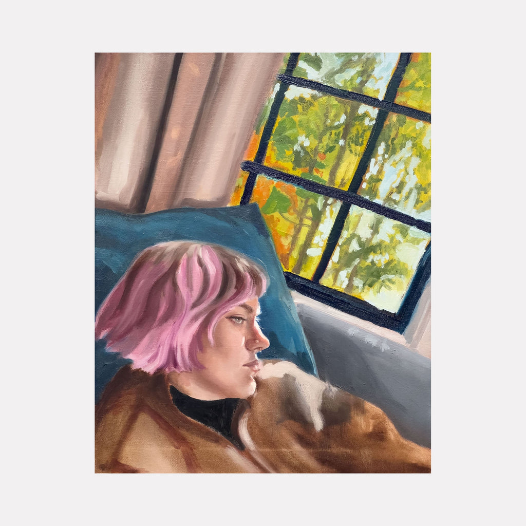 The artwork 'Haircut' by Jillian Shea depicts a serene indoor scene with a profile view against a window. Pink hair cascades in gentle waves, contrasting with a tan jacket and black turtleneck. A gridded window reveals autumn-tinted foliage, while soft beige curtains frame the composition. Oil on canvas captures subtle light and shadow interplay. By Jillian Shea.