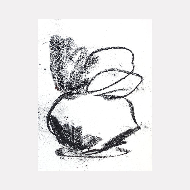 The artwork 'Small Arrangement I' by Todd Gilens features a minimalist black and white abstract drawing created with dry pigment on paper. The piece depicts flowing, organic curves suggesting a simple floral form with delicate brushstrokes and varying tonal values, capturing movement and grace in a 9x12 inch composition.